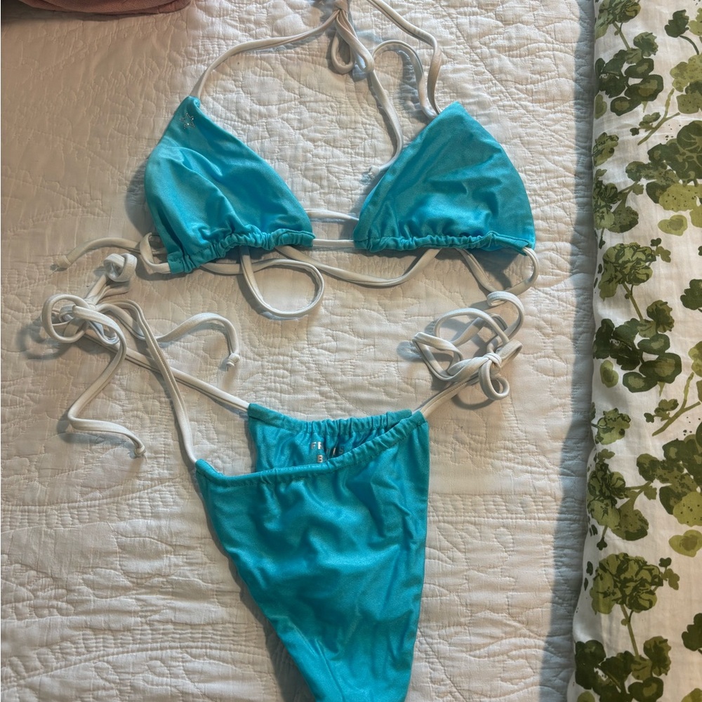 Frankie’s Bikinis blue and white bikini set. Size medium bottom, size large top.